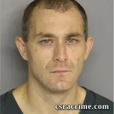 Jon Sims booking photo