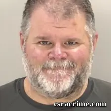 Joseph Marion , Powell JR booking photo