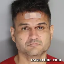 Joseph Tambunga booking photo