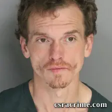 Joshua Baker booking photo
