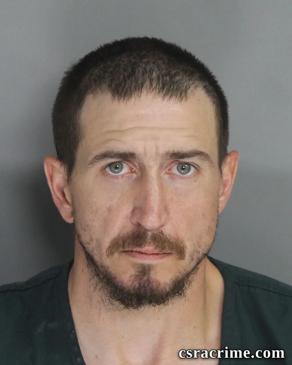 Joshua Clements booking photo