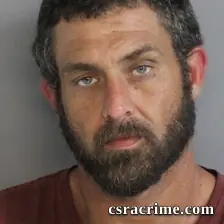 Joshua Curtis booking photo