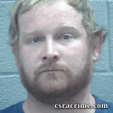 Joshua Miller booking photo