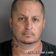 Joshua Olive booking photo