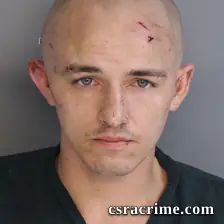Joshua Raymond booking photo