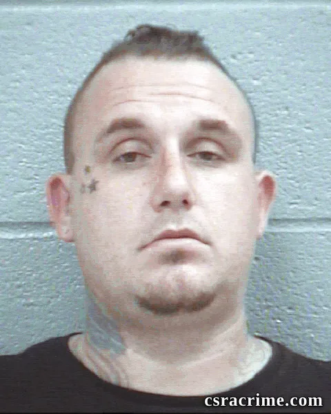 Joshua Routh booking photo