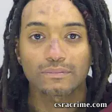 Joshua Troche booking photo