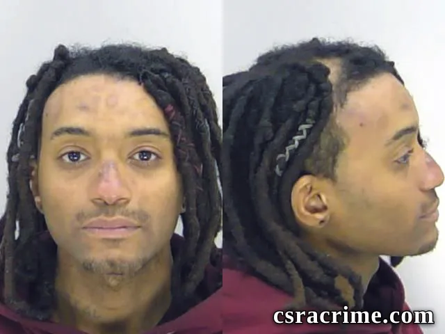Joshua Troche booking photo