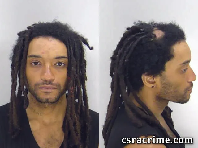 Joshua Troche booking photo