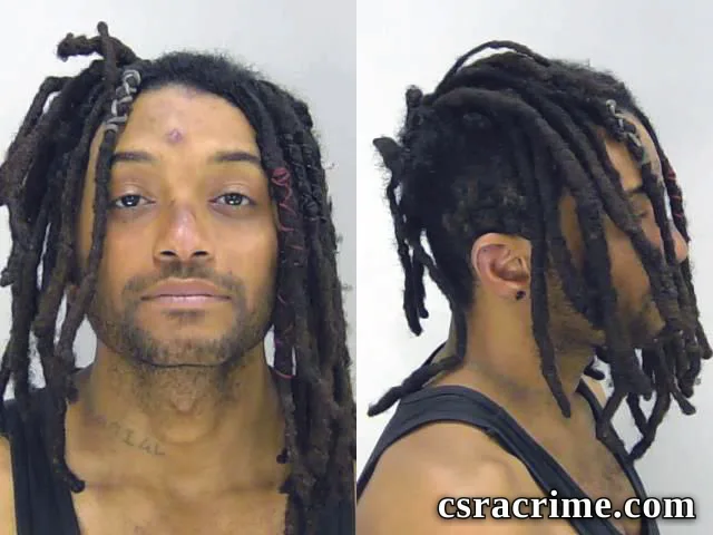 Joshua Trouche booking photo