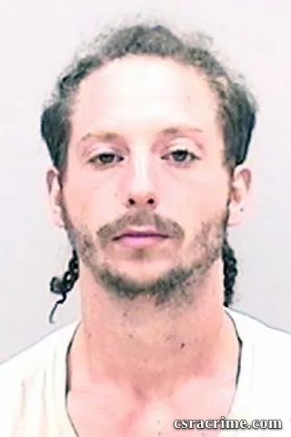 Joshua Yax booking photo