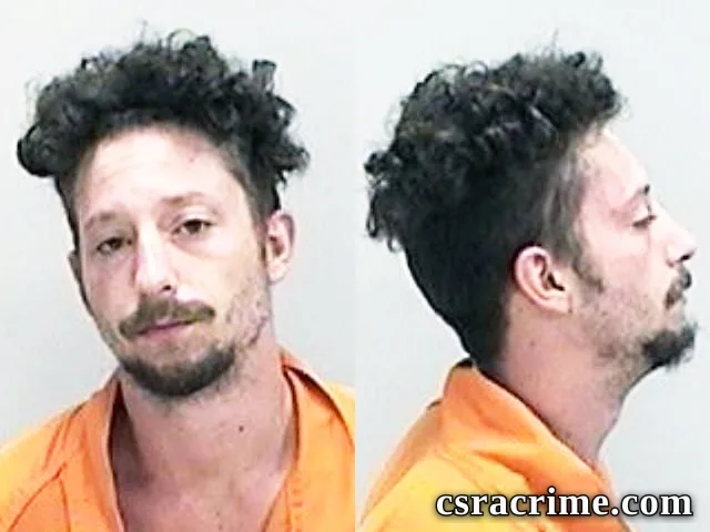 Joshua Yax booking photo