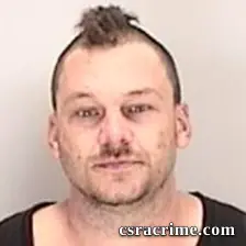 Julian James Oldham III booking photo