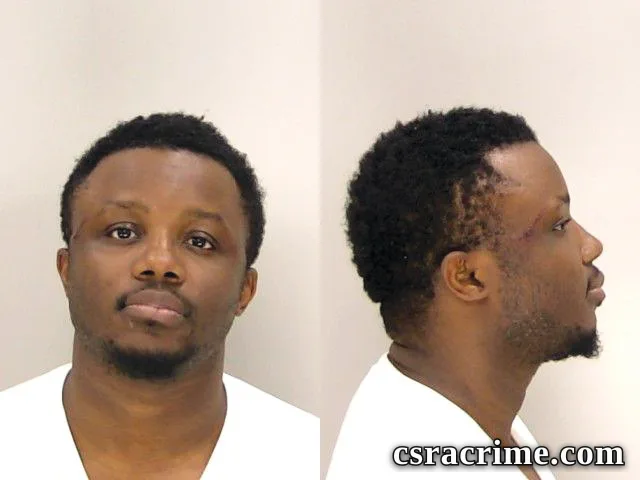 Kenneth Queh booking photo