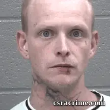 Logan Miller booking photo