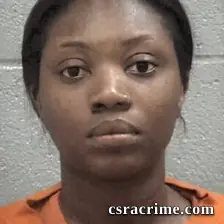 Melvina Lilian Caulker booking photo