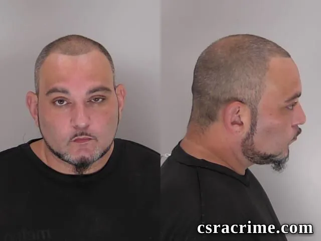 Omar Colon booking photo