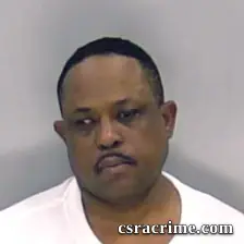Omar Riley booking photo