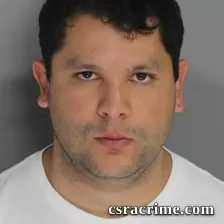 Oscar Arias booking photo