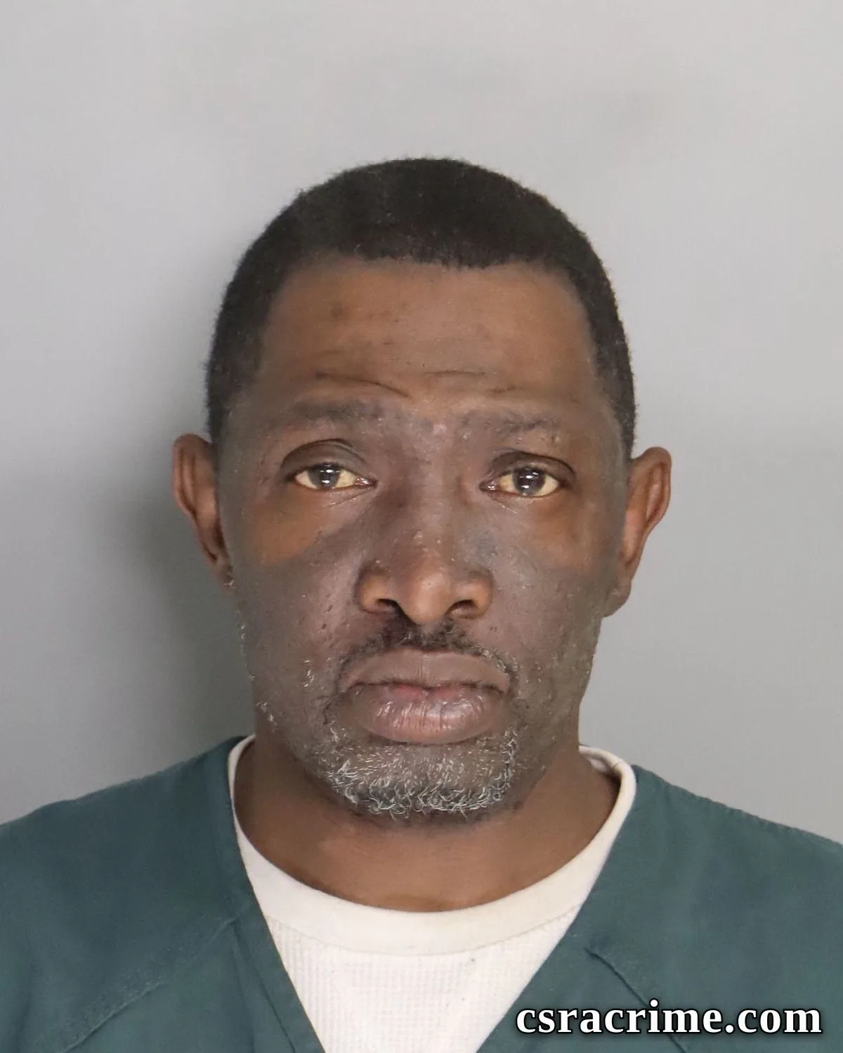 Phil Lewis booking photo