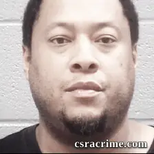 Pierre Aristide booking photo