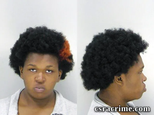 Queveda Clark booking photo