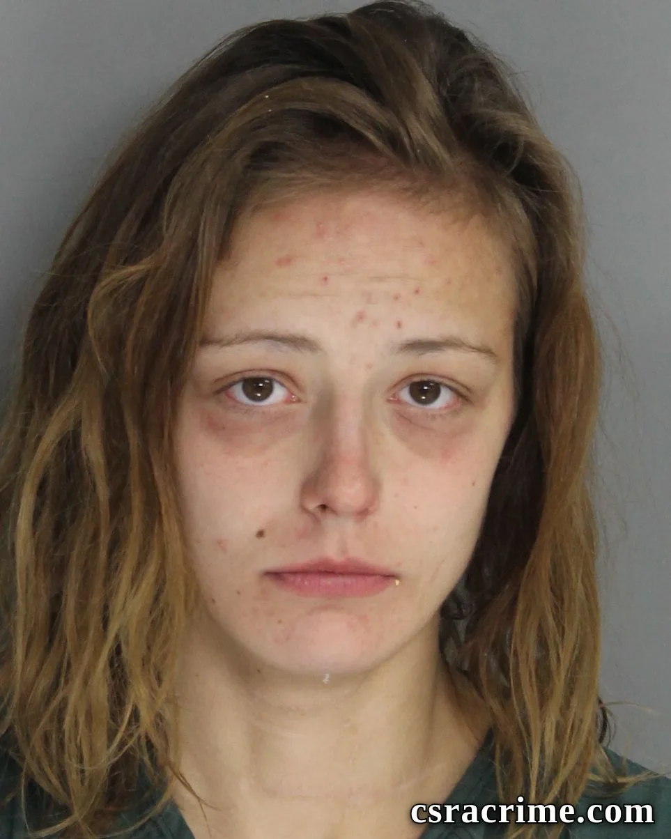 Raven Becker booking photo
