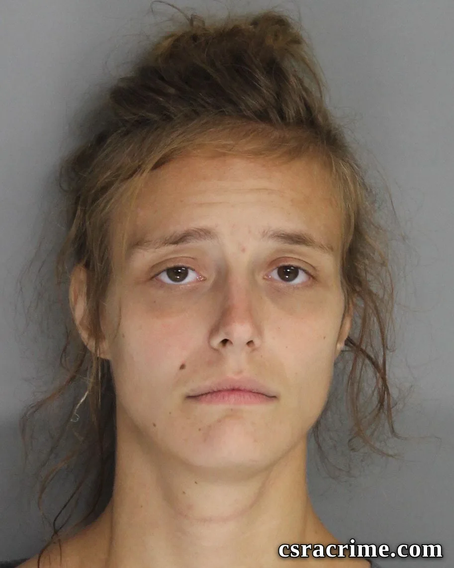 Raven Becker booking photo