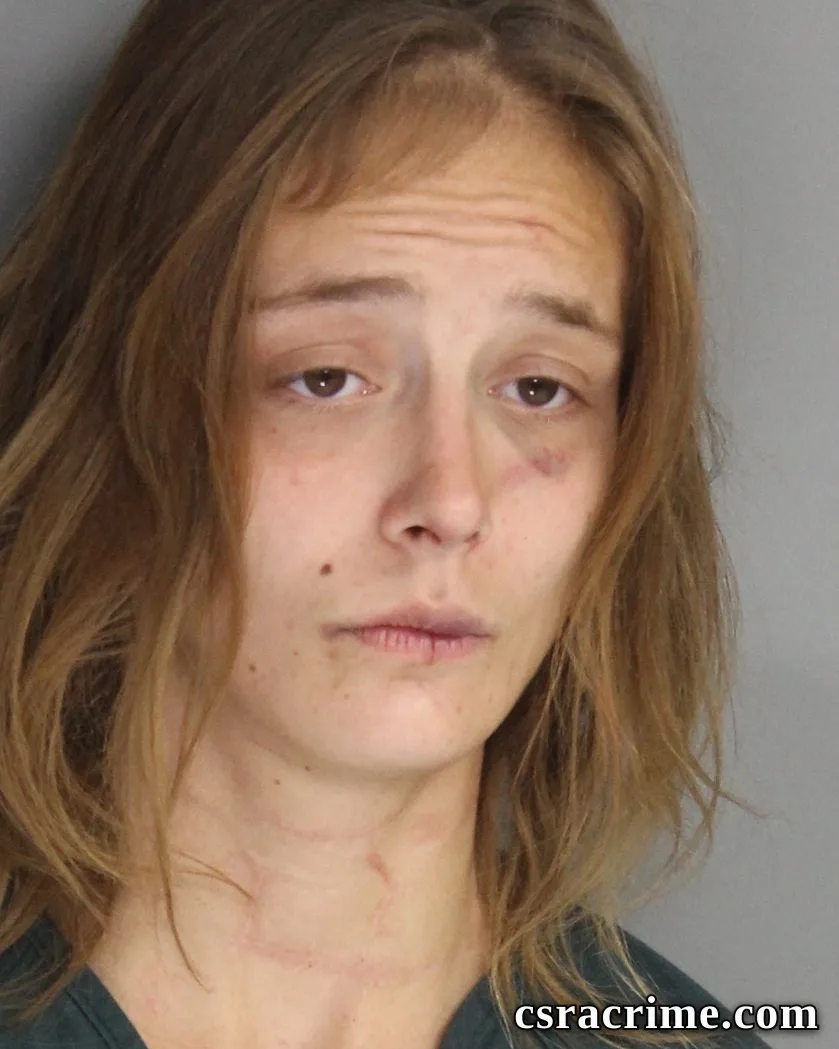 Raven Becker booking photo
