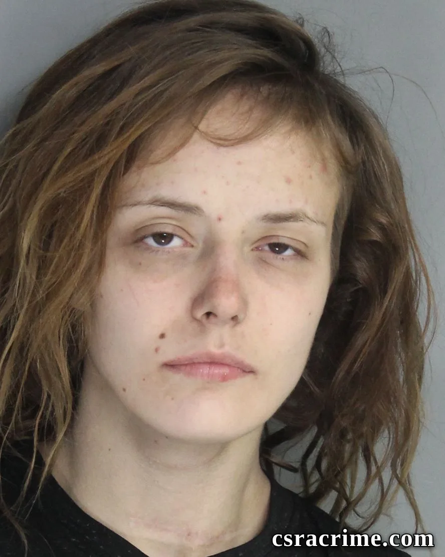 Raven Becker booking photo