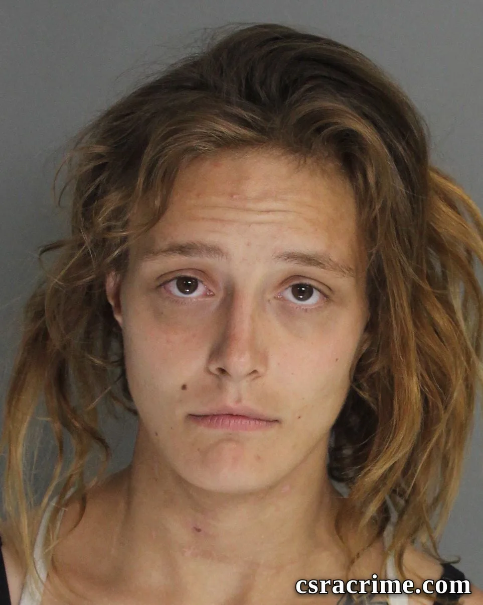 Raven Becker booking photo