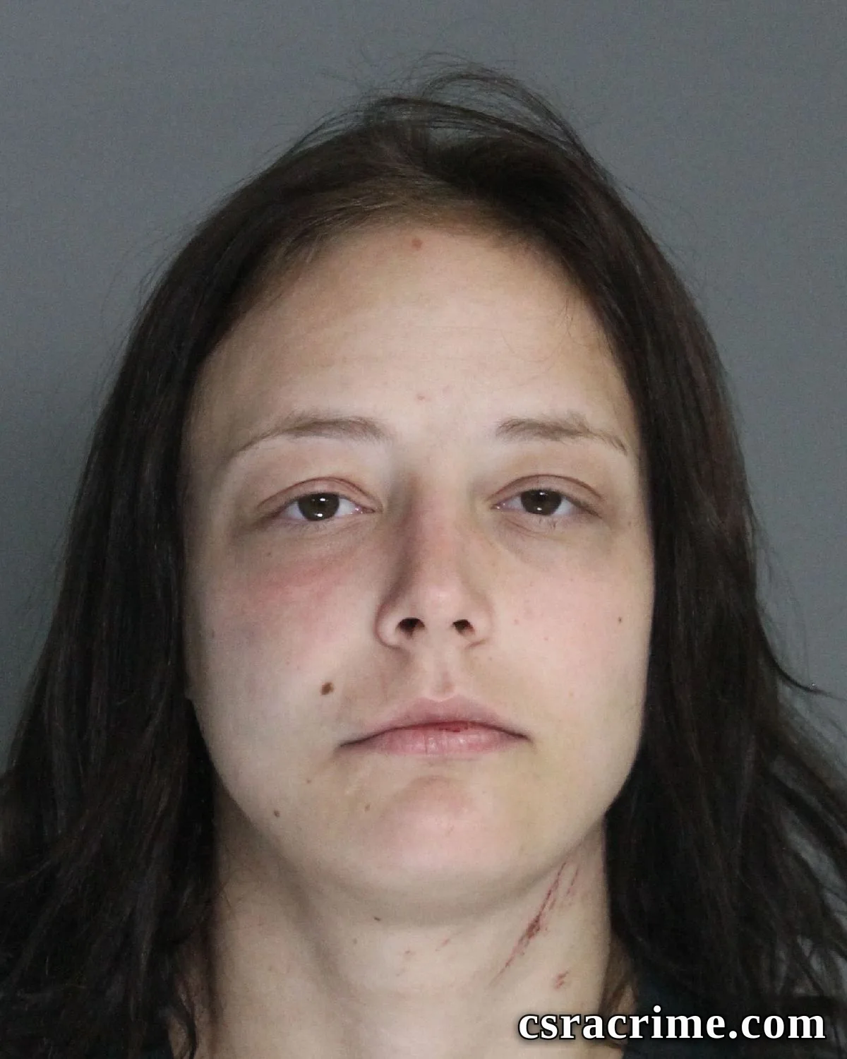 Raven Becker booking photo