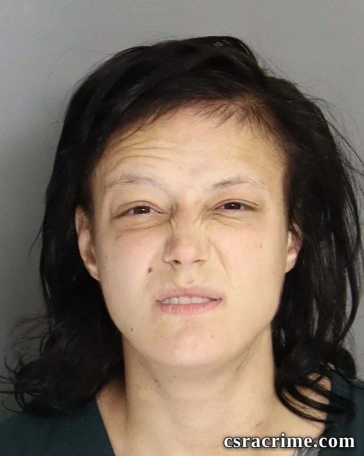 Raven Becker booking photo