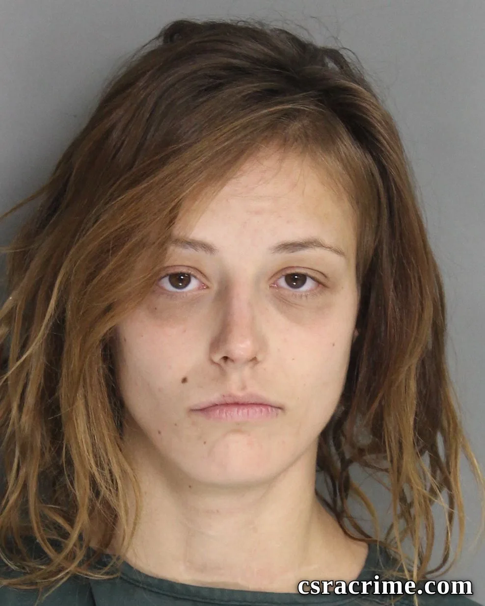 Raven Becker booking photo