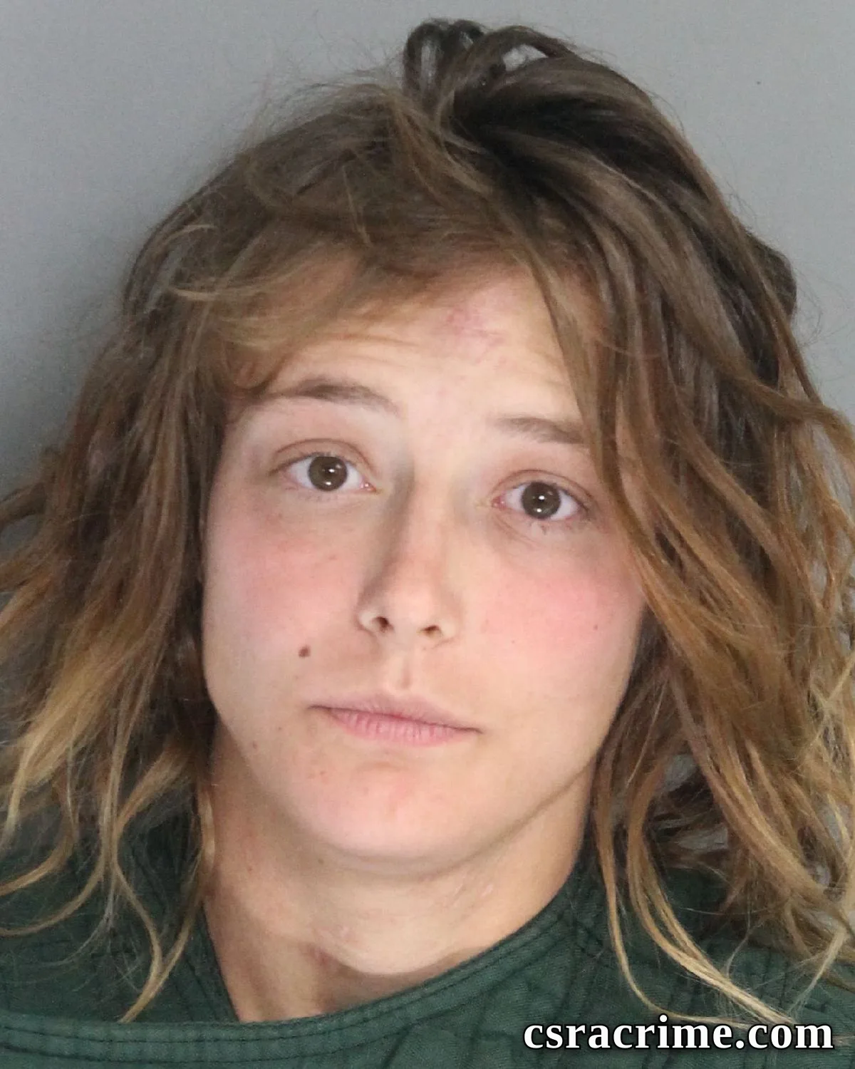 Raven Becker booking photo