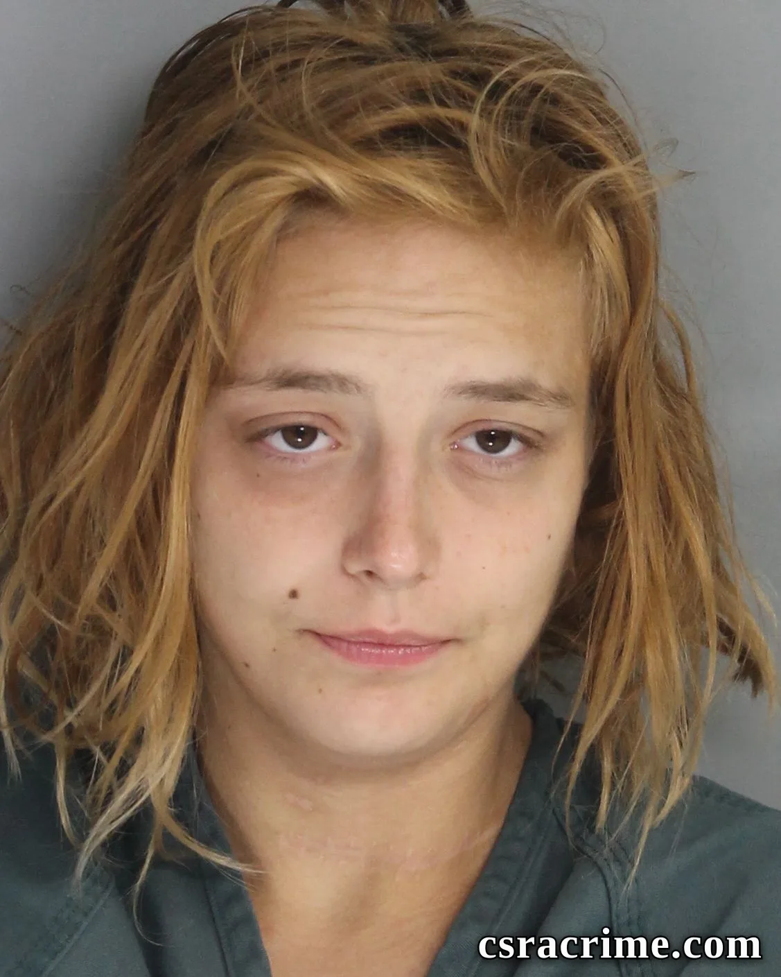 Raven Becker booking photo