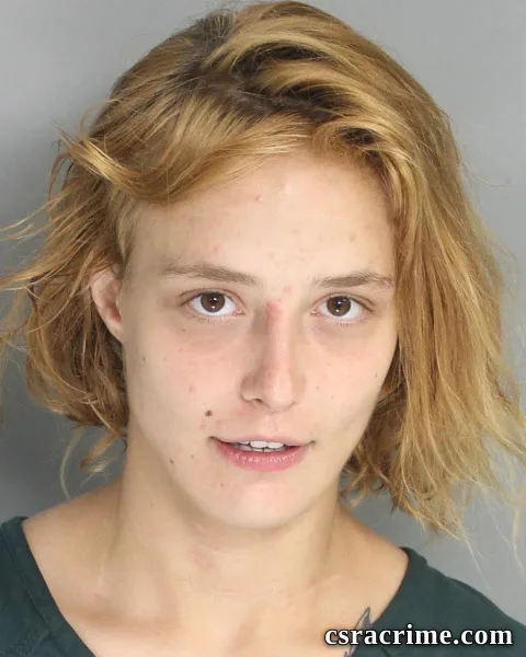 Raven Becker booking photo