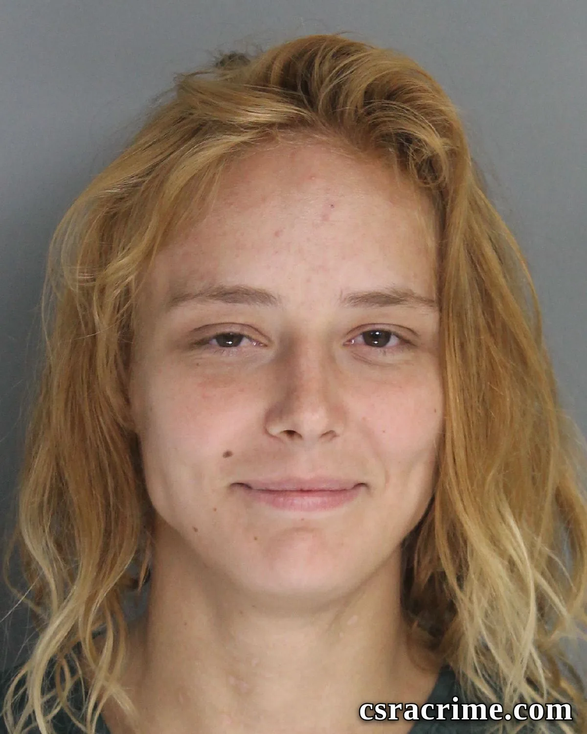Raven Becker booking photo