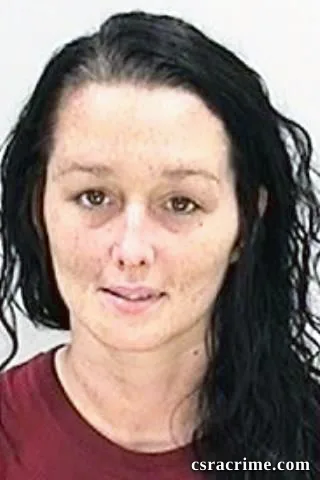 Raven Hartman booking photo
