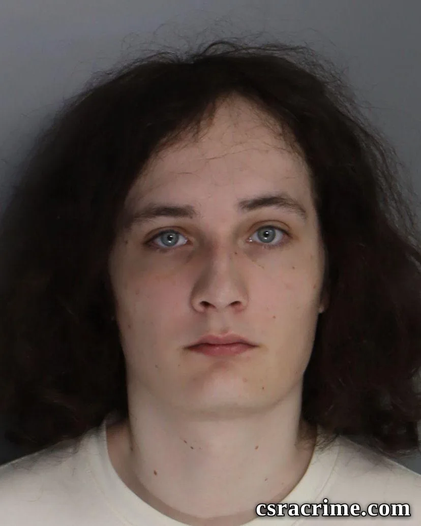 Spenser Nichols booking photo