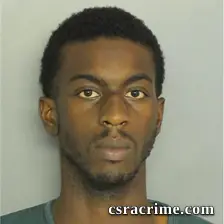 Tommie Robinson booking photo