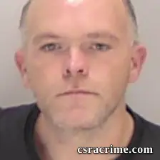 Tony Jr, Powell JR booking photo