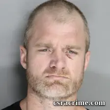 Travis Abbey booking photo