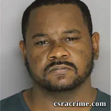 Travis Heath booking photo