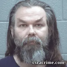 Travis Heath booking photo