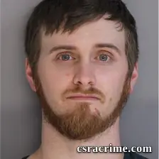 Travis Hill booking photo