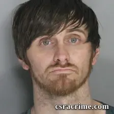 Travis Hill booking photo