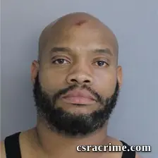 Travis Plunkett booking photo
