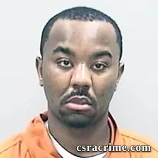 Travis Roland booking photo