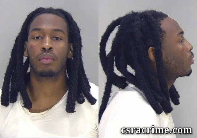 Travis Sloans JR booking photo